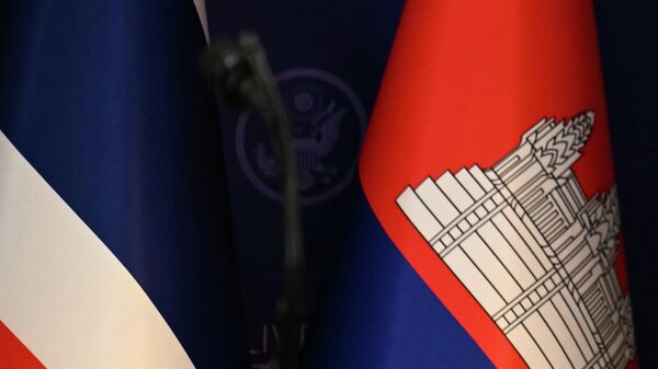 The flags of Thailand, left, and Cambodia, right, are seen ahead of the ceremonial signing of a ceasefire agreement between Thailand and Cambodia on the sidelines of the 47th Association of Southeast Asian Nations (ASEAN) summit in Kuala Lumpur, Malaysia, Sunday, Oct. 26, 2025 - Sputnik India