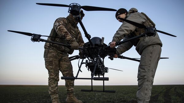 Ukrainian servicemen prepare a Vampire attack drone near the front line in the Donetsk region, Ukraine, Saturday, Feb. 8, 2025. - Sputnik India