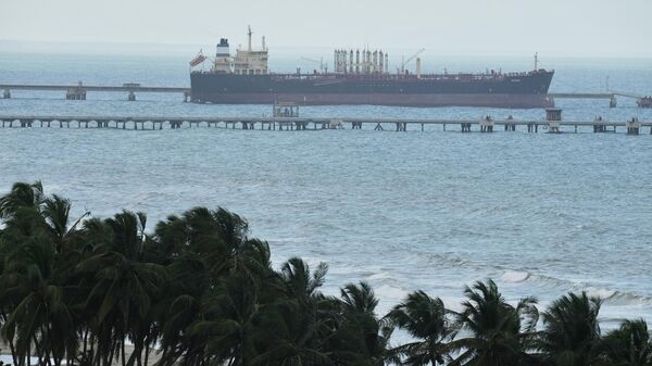 Evana, an oil tanker, is docked at El Palito port in Puerto Cabello, Venezuela, Sunday, Dec. 21, 2025.  - Sputnik भारत