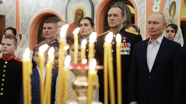 Russian President Vladimir Putin attends an Orthodox Christmas service at the Church of Great Martyr St. George the Victorious - Sputnik भारत