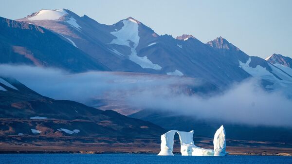 An iceberg floats in the Scoresby Sund, on Sept. 12, 2023, in Greenland.  - Sputnik भारत