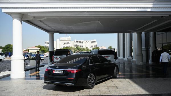 Members of the Russian delegation leave a hotel for the talks between the United States, Russia and Ukraine in Abu Dhabi, United Arab Emirates. - Sputnik India