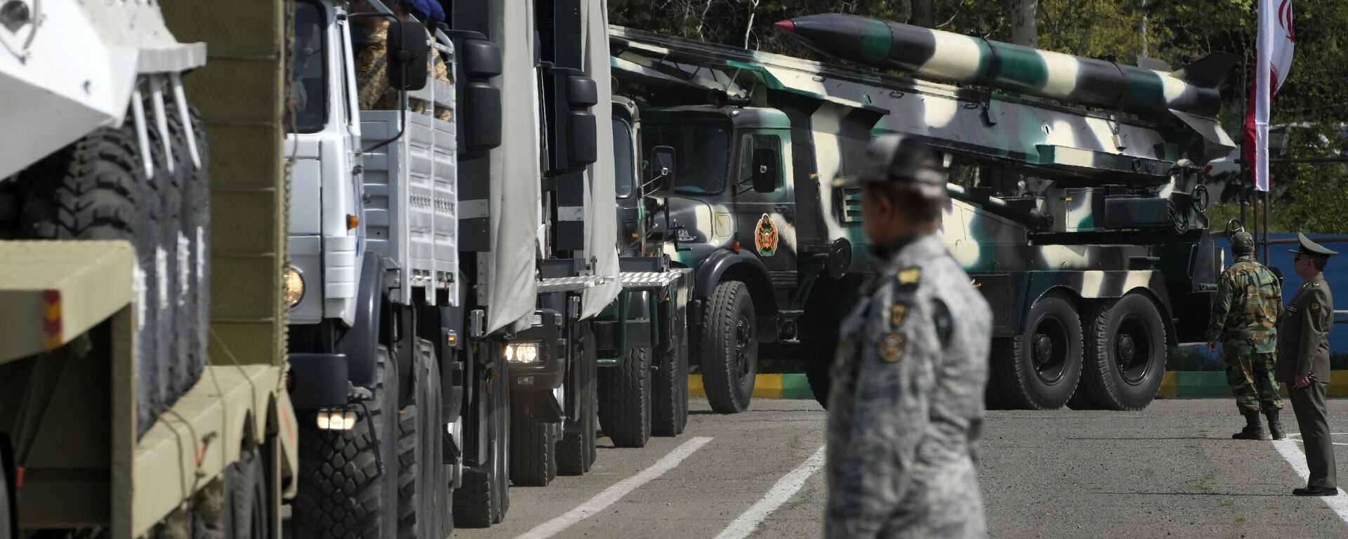 Missiles are carried on trucks during Army Day parade at a military base in northern Tehran, Iran, Wednesday, April 17, 2024. In the parade, President Ebrahim Raisi warned that the tiniest invasion by Israel would bring a massive and harsh response, as the region braces for potential Israeli retaliation after Iran's attack over the weekend. - Sputnik भारत, 1920, 26.01.2026