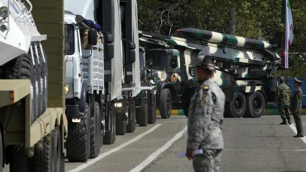 Missiles are carried on trucks during Army Day parade at a military base in northern Tehran, Iran, Wednesday, April 17, 2024. In the parade, President Ebrahim Raisi warned that the tiniest invasion by Israel would bring a massive and harsh response, as the region braces for potential Israeli retaliation after Iran's attack over the weekend. - Sputnik भारत