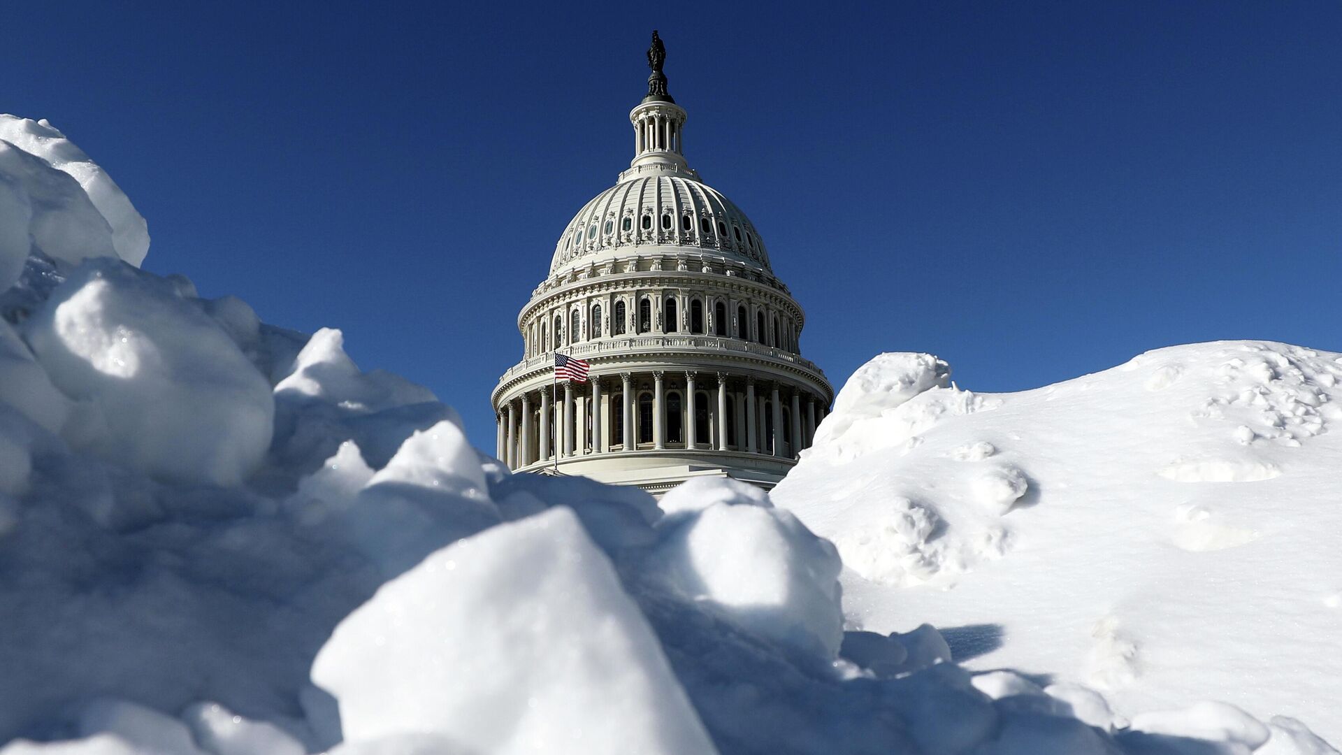 The US Capitol is photographed after a snowstorm, Tuesday, Jan. 27, 2026, in Washington. - Sputnik भारत, 1920, 08.02.2026