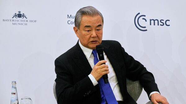 China's Foreign Minister Wang Yi speaks during the Munich Security Conference in Munich, Germany, Saturday, Feb. 14, 2026. - Sputnik India
