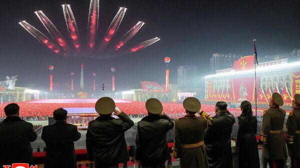 North Korean leader Kim Jong Un and his daughter Kim Ju Ae watch a flypast during a military parade to commemorate the Ninth Congress of the ruling Workers' Party of Korea (WPK) in Pyongyang, North Korea, February 25, 2026, in this picture released by North Korea's official Korean Central News Agency.     - Sputnik भारत
