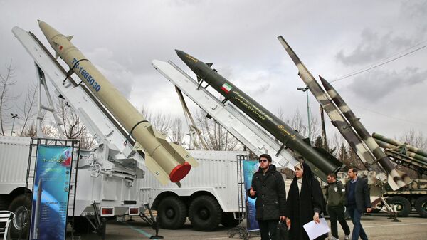 People visit a military exhibition marking the 40th anniversary of Iran's Islamic Revolution in Tehran, Iran, Feb. 3, 2019.  - Sputnik भारत