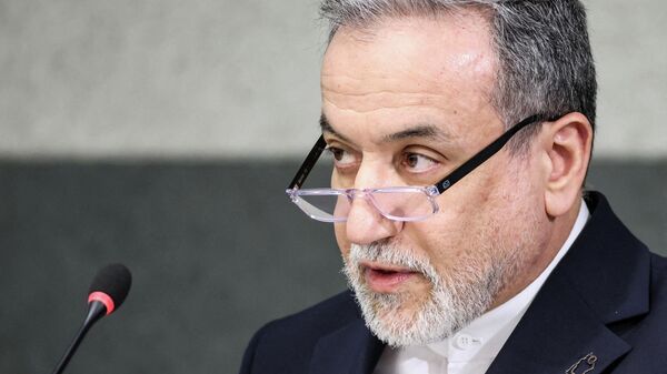 Iran's Foreign Minister Abbas Araghchi addresses a special session of the Conference on Disarmament at the United Nations, aside of U.S.-Iran talks in Geneva, Switzerland, February 17, 2026.  - Sputnik भारत