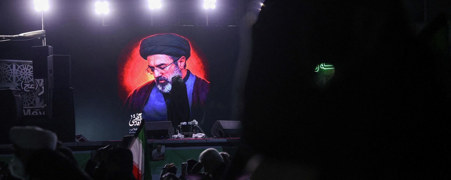 A picture of Iran's new supreme leader, Mojtaba Khamenei, is displayed on a screen in Tehran, amid the U.S.-Israeli conflict with Iran, in Tehran, Iran, March 9, 2026.  - Sputnik भारत, 1920, 09.03.2026