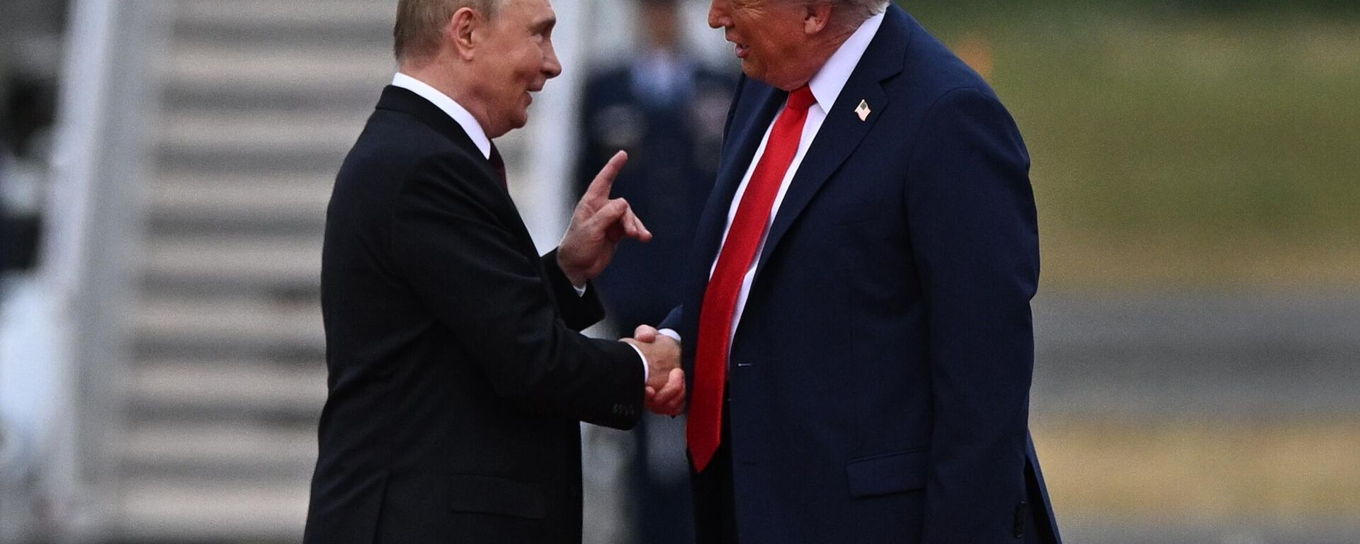 US President Donald Trump greets Russian President Vladimir Putin on the tarmac after they arrived to attend a meeting at Joint Base Elmendorf-Richardson in Anchorage, Alaska, the United States. August 15, 2025. - Sputnik India, 1920, 10.03.2026