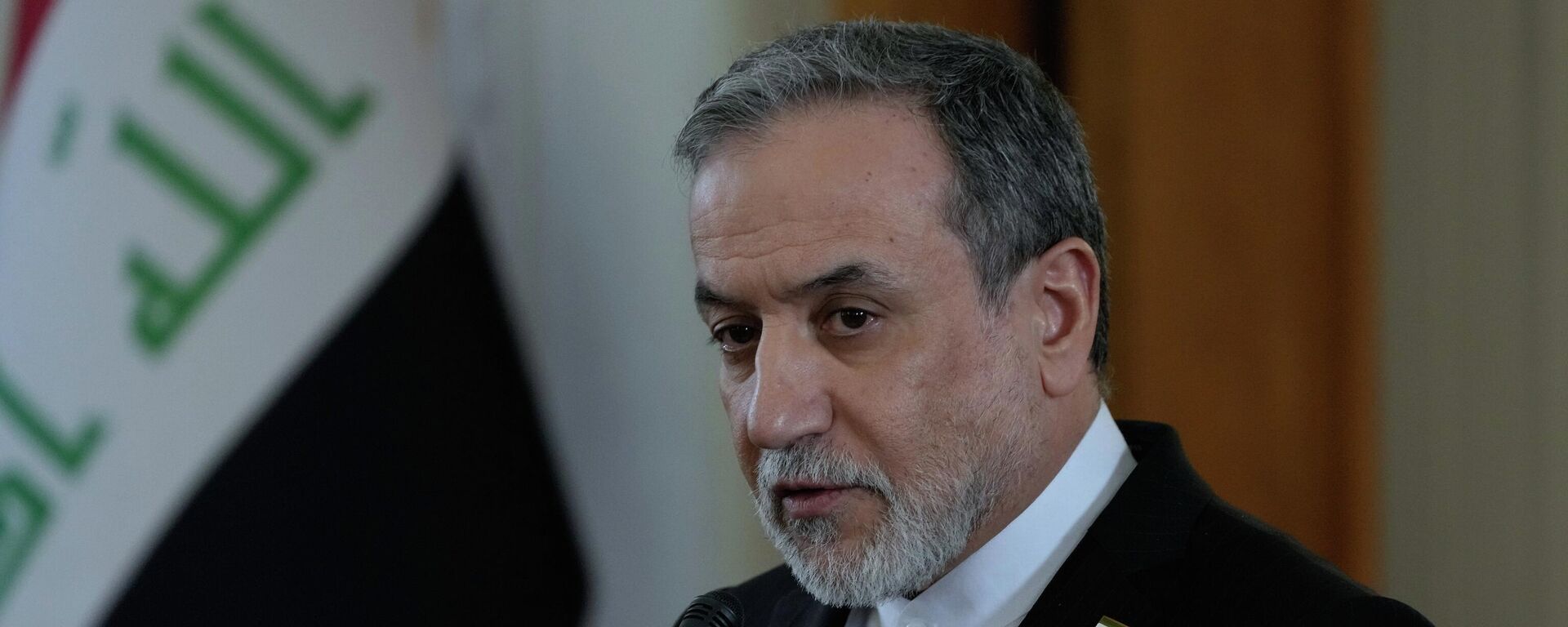 Iranian Foreign Minister Abbas Araghchi speaks in a joint press briefing with his Iraqi counterpart Fuad Hussein in Tehran, Iran, Sunday, Jan. 18, 2026. (AP Photo/Vahid Salemi) - Sputnik India, 1920, 16.03.2026