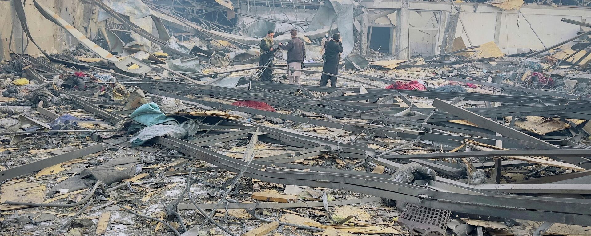 Media personnel work at the site of a drug users rehabilitation hospital destroyed in what the Taliban said was a Pakistani air strike in Kabul, Afghanistan, March 17, 2026. - Sputnik भारत, 1920, 17.03.2026