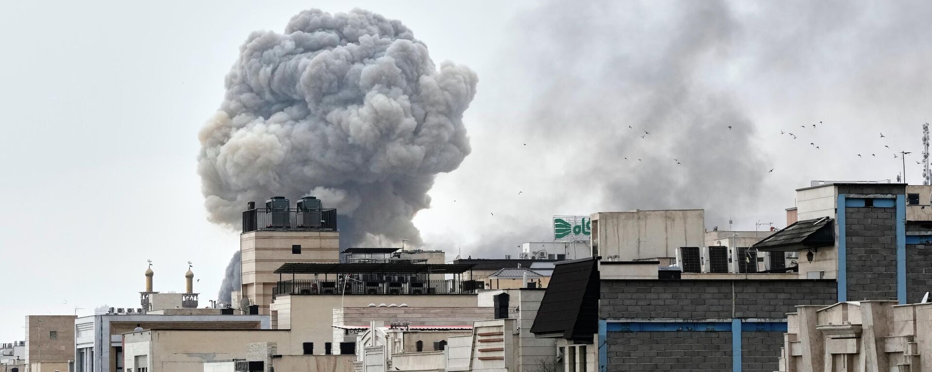 A plume of smoke rises after a strike in Tehran, Iran, Monday, March 2, 2026. (AP Photo/Vahid Salemi) - Sputnik India, 1920, 06.04.2026