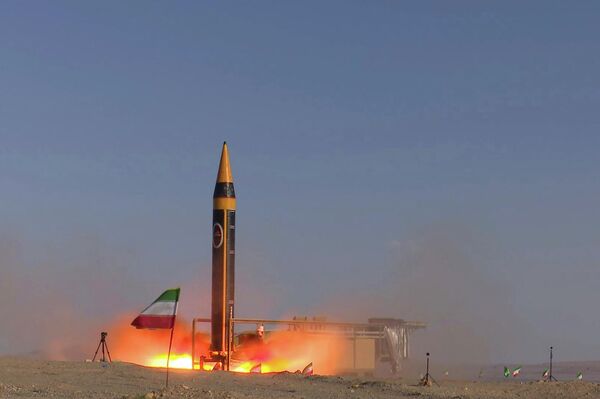 In this photo released by the Iranian Defense Ministry on May 25, 2023, Khorramshahr-4 missile is launched at an undisclosed location, Iran (Iranian Defense Ministry via AP) - Sputnik India