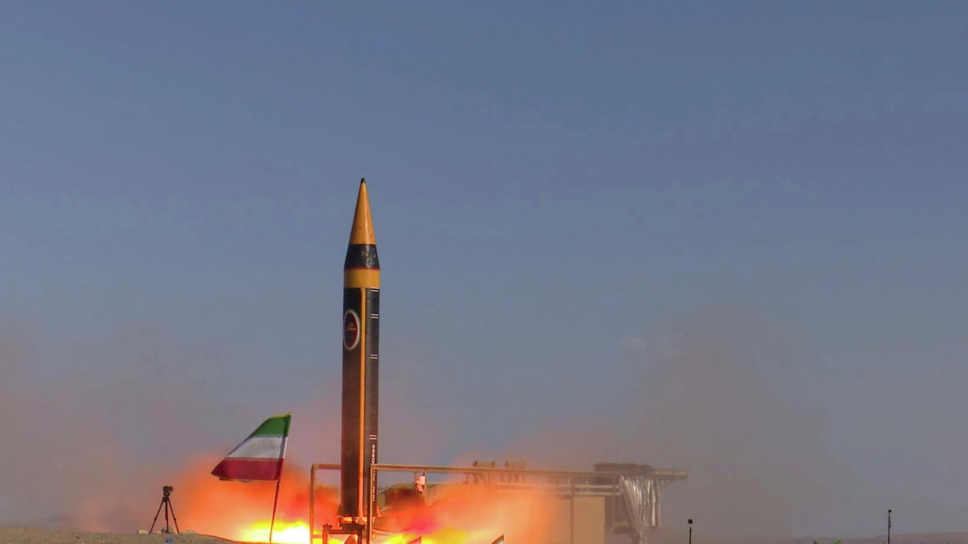 In this photo released by the Iranian Defense Ministry on May 25, 2023, Khorramshahr-4 missile is launched at an undisclosed location, Iran (Iranian Defense Ministry via AP) In this photo released by the Iranian Defense Ministry on May 25, 2023, Khorramshahr-4 missile is launched at an undisclosed location, Iran (Iranian Defense Ministry via AP) - Sputnik भारत, 1920, 23.03.2026