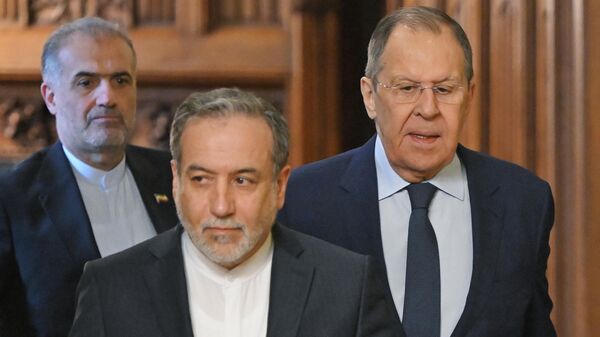  Russian Foreign Minister Sergey Lavrov with Iranian Foreign Minister Abbas Araghchi - Sputnik India