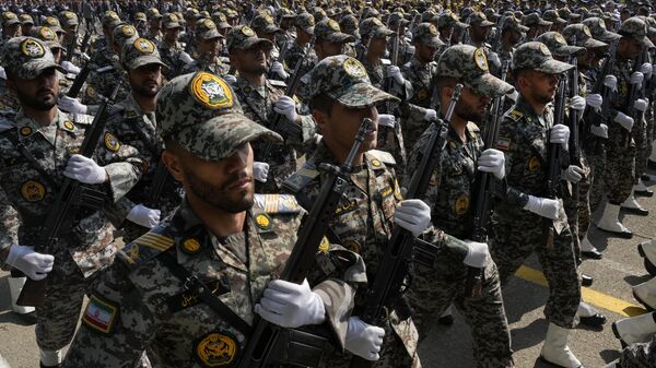 Iranian army members march during Army Day parade at a military base - Sputnik भारत