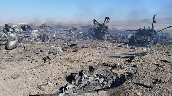 In this image provided by Sepahnews, the Iranian Revolutionary Guard's official website, wreckage is shown at what Iran's state TV claimed was the site of a downed American transport plane and two helicopters involved in a rescue operation, in Isfahan province, Iran, April, 2026 - Sputnik India