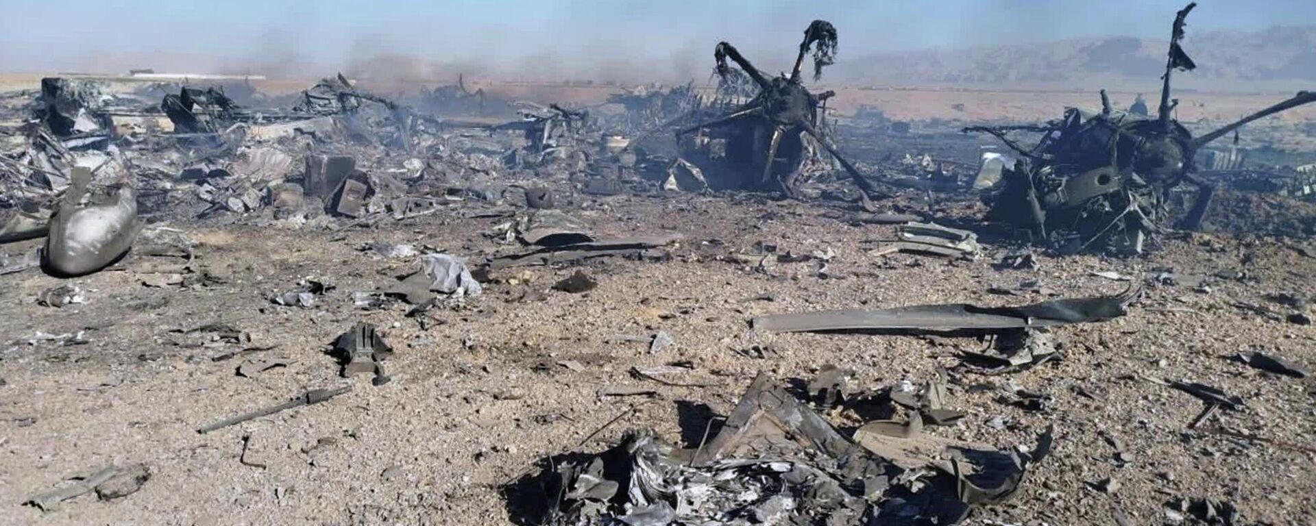 In this image provided by Sepahnews, the Iranian Revolutionary Guard's official website, wreckage is shown at what Iran's state TV claimed was the site of a downed American transport plane and two helicopters involved in a rescue operation, in Isfahan province, Iran, April, 2026 - Sputnik India, 1920, 06.04.2026