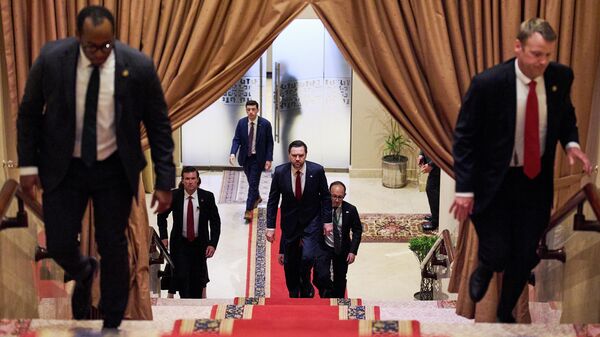 U.S. Vice President JD Vance, center, walks up a flight of stairs to meet with Pakistan's Prime Minister Shehbaz Sharif, Saturday, April 11, 2026, in Islamabad, for talks about Iran. - Sputnik India