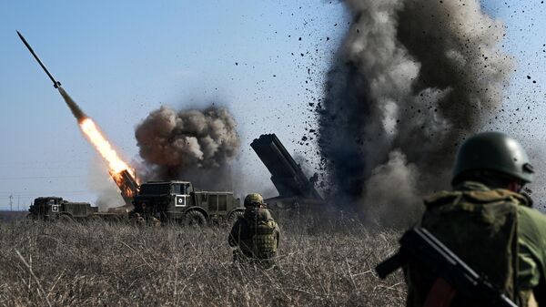 Russian servicemen of the artillery brigade division of the Tsentr battlegroup of forces fire a BM-27 9K57 Uragan (Hurricane) multiple launch rocket system towards positions of the Ukrainian Armed Forces  - Sputnik India