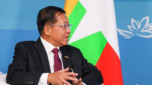 Myanmar State Administration Council Chairman Senior General Min Aung Hlaing speaks to Russian President Vladimir Putin during their meeting on the sideline of the Eastern Economic Forum in Vladivostok, Russia, Wednesday, Sept. 7, 2022 - Sputnik India