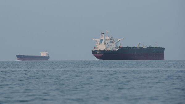 Tankers anchored in the Strait of Hormuz off the coast of Qeshm Island, Iran, April 18, 2026.  - Sputnik India