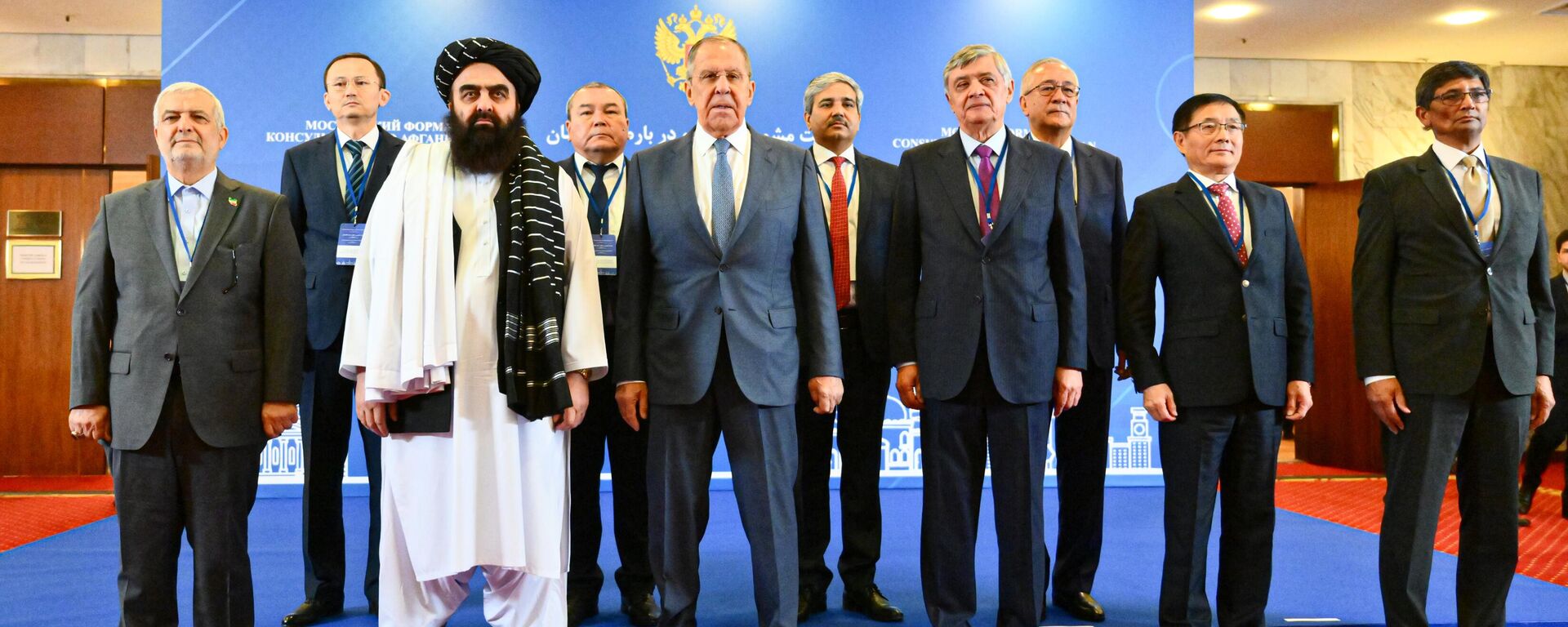 From left to right: Iranian Ambassador to Afghanistan Hassan Kazemi Qomi, Acting Afghan Foreign Minister, member of the Taliban* leadership Amir Khan Muttaqi, Russian Foreign Minister Sergei Lavrov, Russian Presidential Special Representative for Afghanistan Zamir Kabulov and other officials at a joint photo session as part of the 6th meeting of the Moscow format of consultations on Afghanistan. October 4, 2024. - Sputnik India, 1920, 15.05.2026