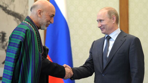 From right: Presidents Vladimir Putin of Russia and Hamid Karzai of the Islamic Republic of Afghanistan (File) - Sputnik भारत