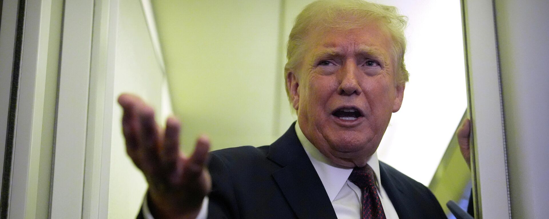 President Donald Trump speaks to reporters aboard Air Force One, Sunday, March 15, 2026, en route from West Palm Beach, Fla. to Joint Base Andrews, Md. - Sputnik भारत, 1920, 06.05.2026