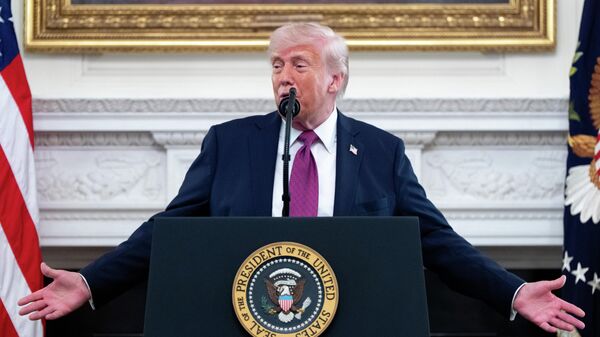 President Donald Trump speaks during an event for NCAA national champions in the State Dining Room of the White House, Tuesday, April 21, 2026, in Washington. (AP Photo/Alex Brandon) - Sputnik भारत