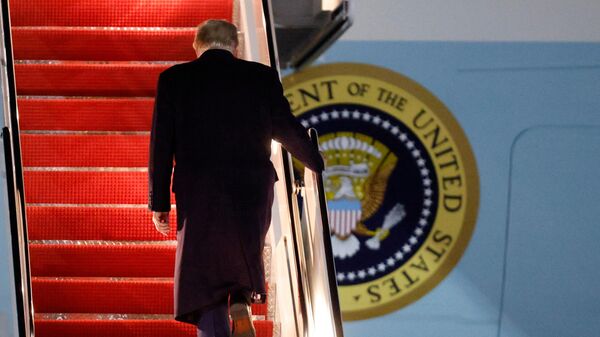President Donald Trump walks up the stairs of Air Force One as he boards upon his arrival at Joint Base Andrews, Md., Friday, Oct. 24, 2025.  - Sputnik भारत
