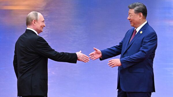Russian President Vladimir Putin and President of the People's Republic of China Xi Jinping at the welcoming ceremony of the heads of the Shanghai Cooperation Organization (SCO) member states in Tianjin. - Sputnik India