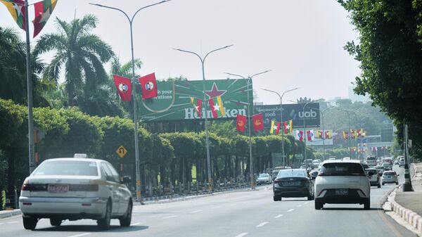Vehicles make their ways on a road Sunday, Feb.1, 2026, in Yangon, Myanmar.  - Sputnik भारत