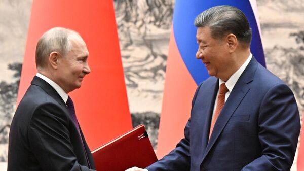 Russian President Vladimir Putin and Chinese President Xi Jinping. - Sputnik India
