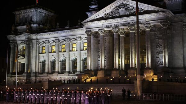 Soldiers perform a grand tattoo ceremony marking the end of German forces Bundeswehr Afghanistan Mission - Sputnik भारत