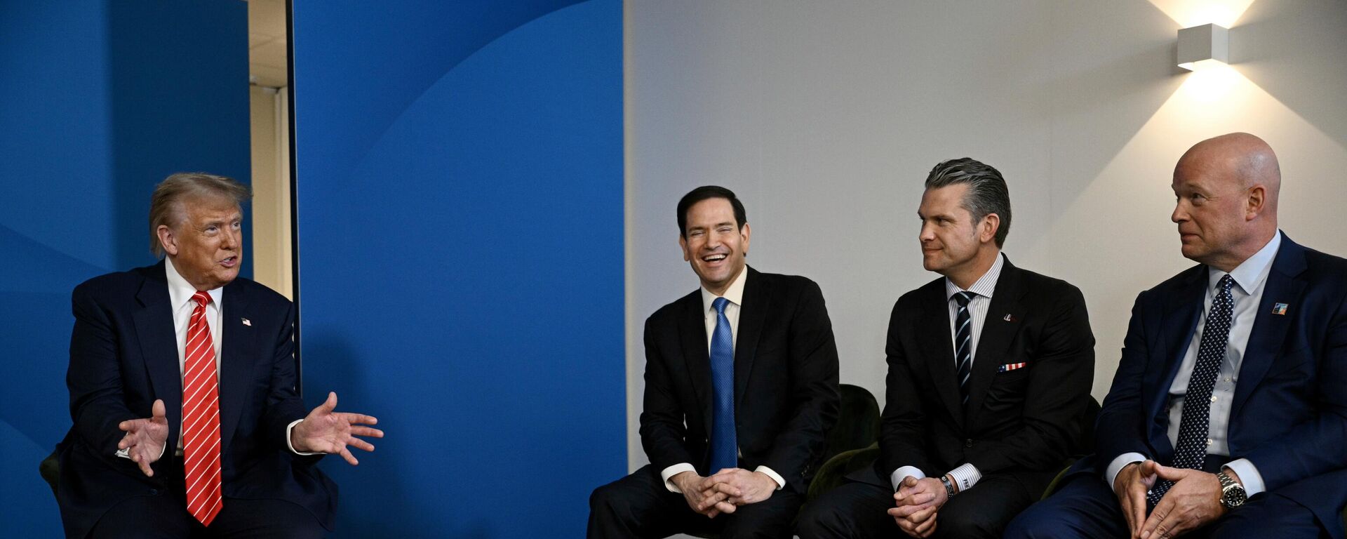 US President Donald Trump, left, speaks next to, from left, US Secretary of State Marco Rubio, US Defence Secretary Pete Hegseth and US' ambassador to NATO Matthew Whitaker, during a meeting with NATO Secretary General Mark Rutte at the NATO summit of heads of state and government in The Hague, Netherlands, Wednesday, June 25, 2025 - Sputnik India, 1920, 23.05.2026