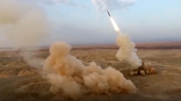 This frame grab from video shows the launching of underground ballistic missiles by the Iranian Revolutionary Guard during a military exercise, July 29, 2020. Iran's paramilitary guard launched underground ballistic missiles as part of an exercise involving a mock-up aircraft carrier in the Strait of Hormuz, state television reported Wednesday - Sputnik India