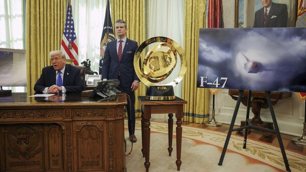 President Donald Trump, left, and Secretary of Defense Pete Hegseth listen as an image of an F-47 sixth-generation fighter jet is displayed during an event in the Oval Office of the White House in Washington, Friday, March 21, 2025.  - Sputnik India