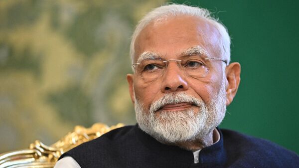 Indian Prime Minister Narendra Modi attends a meeting with Russian President Vladimir Putin at the Kremlin in Moscow, Russia. - Sputnik भारत
