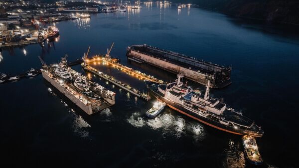 Towing of the nuclear icebreaker Lenin from its mooring place at the Murmansk Marine Station to the PD-3 dock located in the port waters for scheduled repairs. The legendary nuclear icebreaker will be prepared for the anniversary of the nuclear icebreaker fleet, with its hull and wheelhouse painted. In addition, the hull tanks and bottom-side fittings will be inspected. August 13, 2024. - Sputnik भारत