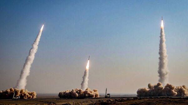This handout photo provided by Iran's Revolutionary Guard Corps (IRGC) official website via SEPAH News on January 15, 2021, shows a launch of missiles during a military drill in an unknown location in central Iran - Sputnik India