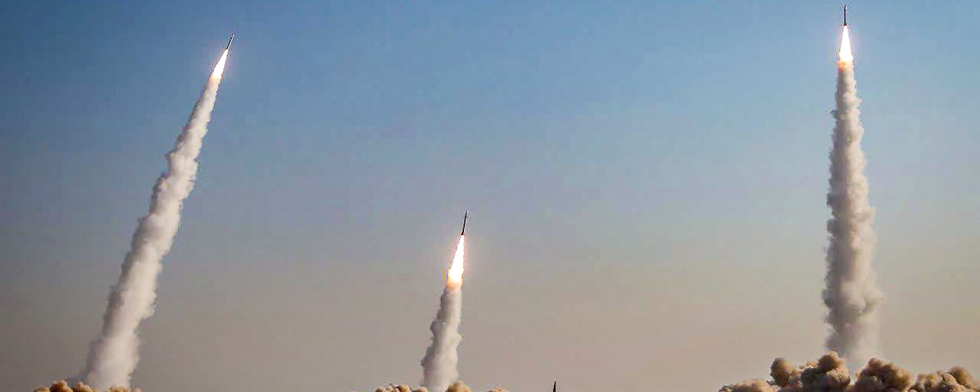 This handout photo provided by Iran's Revolutionary Guard Corps (IRGC) official website via SEPAH News on January 15, 2021, shows a launch of missiles during a military drill in an unknown location in central Iran - Sputnik India, 1920, 08.06.2026