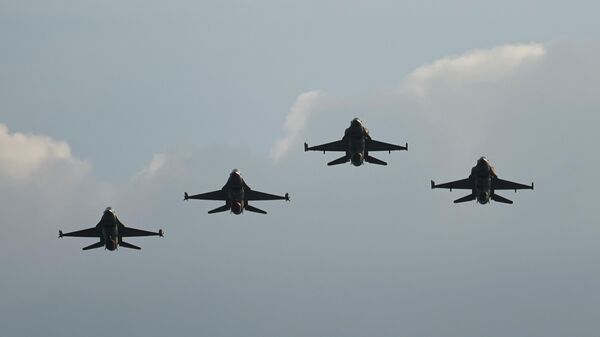 Israeli Air Force F16 fighter jets perform in an air show during a graduation ceremony for new pilots in Hatzerim base near the southern Israeli city of Beersheba, Wednesday, Dec. 28, 2022 - Sputnik India