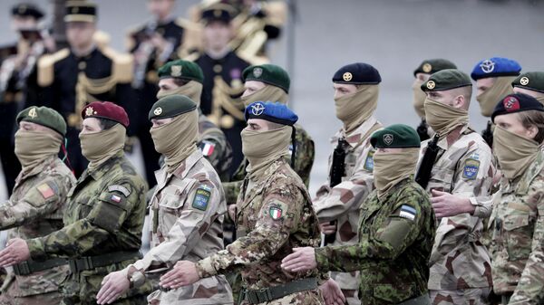 Soldiers from the European Task force Takuba march during the annual Bastille Day parade on the Champs-Elysees in Paris, Wednesday July 14, 2021 - Sputnik India