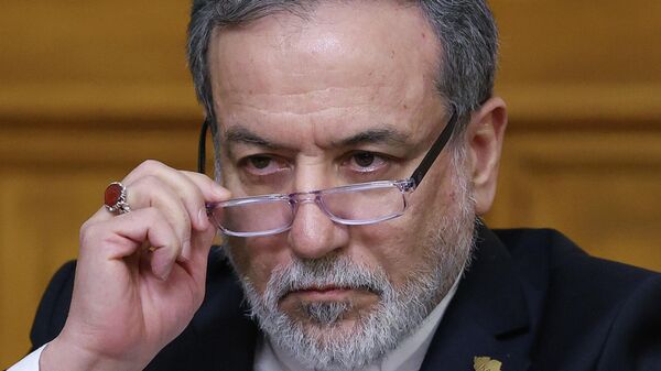 Iranian Foreign Minister Abbas Araghchi looks on during a joint news conference with Russian Foreign Minister Sergey Lavrov at Zinaida Morozova's Mansion in Moscow, Wednesday, Dec. 17, 2025. (Ramil Sitdikov/Pool Photo via AP) - Sputnik India