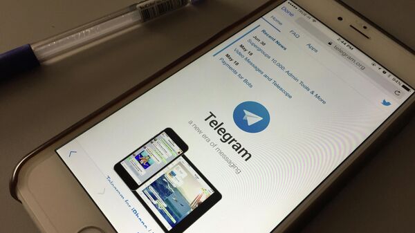 The messaging app Telegram is displayed on a smartphone, Saturday, July 15, 2017, in Bangkok, Thailand. Indonesia says it’s blocking web versions of the Telegram instant messaging app and will block the app completely if it continues to be a forum for radical propaganda and violent militants. (AP Photo) - Sputnik India