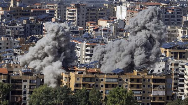 Smoke rises after an Israeli airstrike on Dahiyeh, in the southern suburb of Beirut, Lebanon, Tuesday, Nov. 12, 2024. - Sputnik India