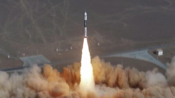 A Kuaizhou-11 Y7 carrier rocket blasts off from the Jiuquan Satellite Launch Center in Northwest China Gansu Province, sending eight satellites into preset orbits, on March 16, 2026. - Sputnik India
